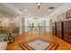 Spacious loft area with hardwood floors, decorative railings, and abundant natural light at 1865 Mason Mill Rd, Decatur, GA 30033