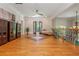 Upstairs loft space with hardwood floors, French doors to a balcony, and views at 1865 Mason Mill Rd, Decatur, GA 30033