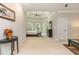 Bright main bedroom with a tray ceiling, seating, and views of the surrounding greenery at 1865 Mason Mill Rd, Decatur, GA 30033