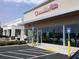 Menchie's Frozen Yogurt storefront with large windows, accessible entrance, and parking area at 1865 Mason Mill Rd, Decatur, GA 30033