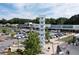 Outdoor shopping center featuring storefronts, ample parking, and community gathering spaces at 1865 Mason Mill Rd, Decatur, GA 30033