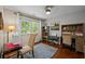 Cozy home office featuring hardwood floors, natural light, and functional workspace for productivity at 3912 Edenton Ne Ct, Brookhaven, GA 30319