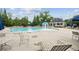 Beautiful community pool featuring a splash fountain and plenty of lounge seating at 4275 Green Summers Dr, Cumming, GA 30028