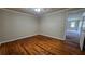 Cozy bedroom with hardwood floors and standard ceiling fan at 6109 N Main Se St, Acworth, GA 30101