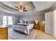 This main bedroom features a tray ceiling, large windows, and a cozy rug at 845 Connell Ln, Lawrenceville, GA 30044