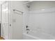 Bathroom features a white tub and shower combination and a small towel bar at 111 Abingdon Way, Sandy Springs, GA 30328