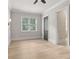Neutral bedroom with large windows at 5114 Brendlynn Dr, Suwanee, GA 30024