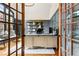 Stylish office with custom wood trim, natural light, and sophisticated decor at 5114 Brendlynn Dr, Suwanee, GA 30024
