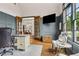 Sophisticated home office with French doors, built-in shelving, and elegant finishes at 5114 Brendlynn Dr, Suwanee, GA 30024