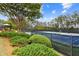 Well-maintained community tennis courts surrounded by lush greenery and a covered gazebo at 5114 Brendlynn Dr, Suwanee, GA 30024