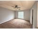 Spacious bedroom features a ceiling fan and a window providing natural light at 2658 Deann Dr, Ellenwood, GA 30294