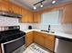 Well-equipped kitchen with stainless steel appliances and bright lighting at 2658 Deann Dr, Ellenwood, GA 30294