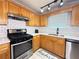 Modern kitchen with stainless steel oven and updated subway tile backsplash at 2658 Deann Dr, Ellenwood, GA 30294