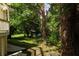 Backyard view from the wooden deck showing an additional storage building at 2831 Carolyn Se Dr, Smyrna, GA 30080