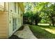 Backyard views showing a concrete patio with mature trees and a wooded area at 2831 Carolyn Se Dr, Smyrna, GA 30080