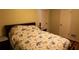 Cozy bedroom with a floral patterned bedspread at 2831 Carolyn Se Dr, Smyrna, GA 30080