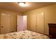 Bedroom featuring neutral walls, closet space, and a bed at 2831 Carolyn Se Dr, Smyrna, GA 30080