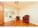 Cozy dining area featuring a stylish chair and view into a spacious living room at 2831 Carolyn Se Dr, Smyrna, GA 30080