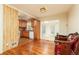 Open floor plan featuring a kitchen with wooden cabinets flowing into a dining area with stylish seating at 2831 Carolyn Se Dr, Smyrna, GA 30080