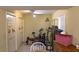 Well-lit recreation room includes gym equipment and storage near doorways and windows at 2831 Carolyn Se Dr, Smyrna, GA 30080