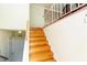 Wooden staircase with white railings, offering a glimpse into the home's interior and design elements at 2831 Carolyn Se Dr, Smyrna, GA 30080