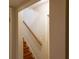 Hallway view of stairs leading up to another floor, featuring wooden banisters at 2831 Carolyn Se Dr, Smyrna, GA 30080