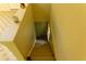 View of a stairwell leading downwards with yellow walls at 2831 Carolyn Se Dr, Smyrna, GA 30080