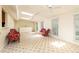 Bright sun room with tile floors, skylights and traditional furniture at 2831 Carolyn Se Dr, Smyrna, GA 30080