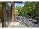 Balcony overlooking parking area and green trees at 1240 Woodland Ne Ave # 7, Atlanta, GA 30324