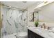 Bathroom featuring glass shower doors, vanity, and modern finishes at 1240 Woodland Ne Ave # 7, Atlanta, GA 30324