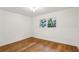Bedroom with hardwood floors and a window view of lush green trees at 1240 Woodland Ne Ave # 7, Atlanta, GA 30324