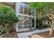 Exterior of building has large windows and doorway at 1240 Woodland Ne Ave # 7, Atlanta, GA 30324