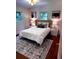 Cozy bedroom with a decorative rug and natural light at 1240 Woodland Ne Ave # 7, Atlanta, GA 30324