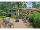 Outdoor seating area with gravel, surrounded by lush greenery at 1240 Woodland Ne Ave # 7, Atlanta, GA 30324