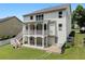 Two-story home featuring a large backyard and private deck, perfect for outdoor entertaining at 1722 Preserve Creek Way, Loganville, GA 30052