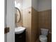 Small bathroom featuring updated tile, toilet, vanity, and mirror at 1722 Preserve Creek Way, Loganville, GA 30052