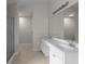 Bathroom with dual sink vanity and shower at 1722 Preserve Creek Way, Loganville, GA 30052
