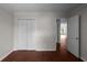 Bedroom with closet and hardwood floors at 1722 Preserve Creek Way, Loganville, GA 30052