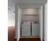 Laundry closet with washer and dryer at 1722 Preserve Creek Way, Loganville, GA 30052