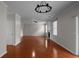 Spacious living room featuring hardwood floors, a fireplace, and modern ceiling fan at 1722 Preserve Creek Way, Loganville, GA 30052