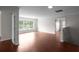 Living room with lots of light and hardwood floors at 1722 Preserve Creek Way, Loganville, GA 30052