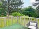 Enjoy a scenic backyard view from the cozy porch, perfect for relaxing outdoors at 2567 Hancock Rd, Social Circle, GA 30025