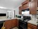 Updated kitchen featuring stainless steel appliances and ample counter space at 2567 Hancock Rd, Social Circle, GA 30025
