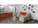 Bright living room with wood-look floors and a comfortable sofa at 2567 Hancock Rd, Social Circle, GA 30025