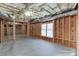 Unfinished basement with exposed beams, insulation, and a concrete floor at 4171 Lantern Hill Dr, Dacula, GA 30019