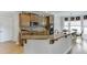 Well-appointed kitchen with granite counters, light wood cabinets, and stainless steel appliances at 4171 Lantern Hill Dr, Dacula, GA 30019