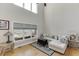 Cozy living room with large windows, comfortable seating, and stylish decor at 4171 Lantern Hill Dr, Dacula, GA 30019