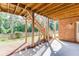 Exterior shot of patio with a backyard view showcasing a wooden staircase at 4171 Lantern Hill Dr, Dacula, GA 30019