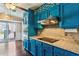Stylish kitchen featuring granite countertops, stainless steel appliances, and backyard access at 6889 Kingsboro Dr, Lithia Springs, GA 30122