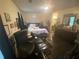 View of a room with dark wooden floors and lots of natural light at 8951 Stonebridge Blvd, Douglasville, GA 30134